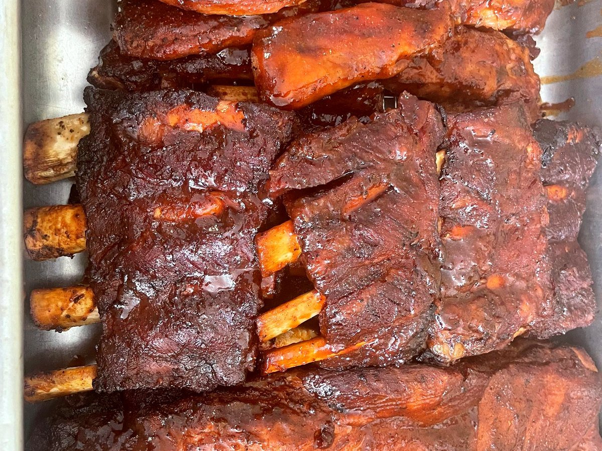 Slow-smoked pork ribs fresh off the pit