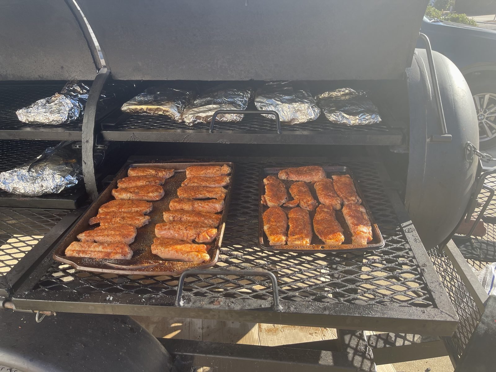 Racks of ribs on the grill